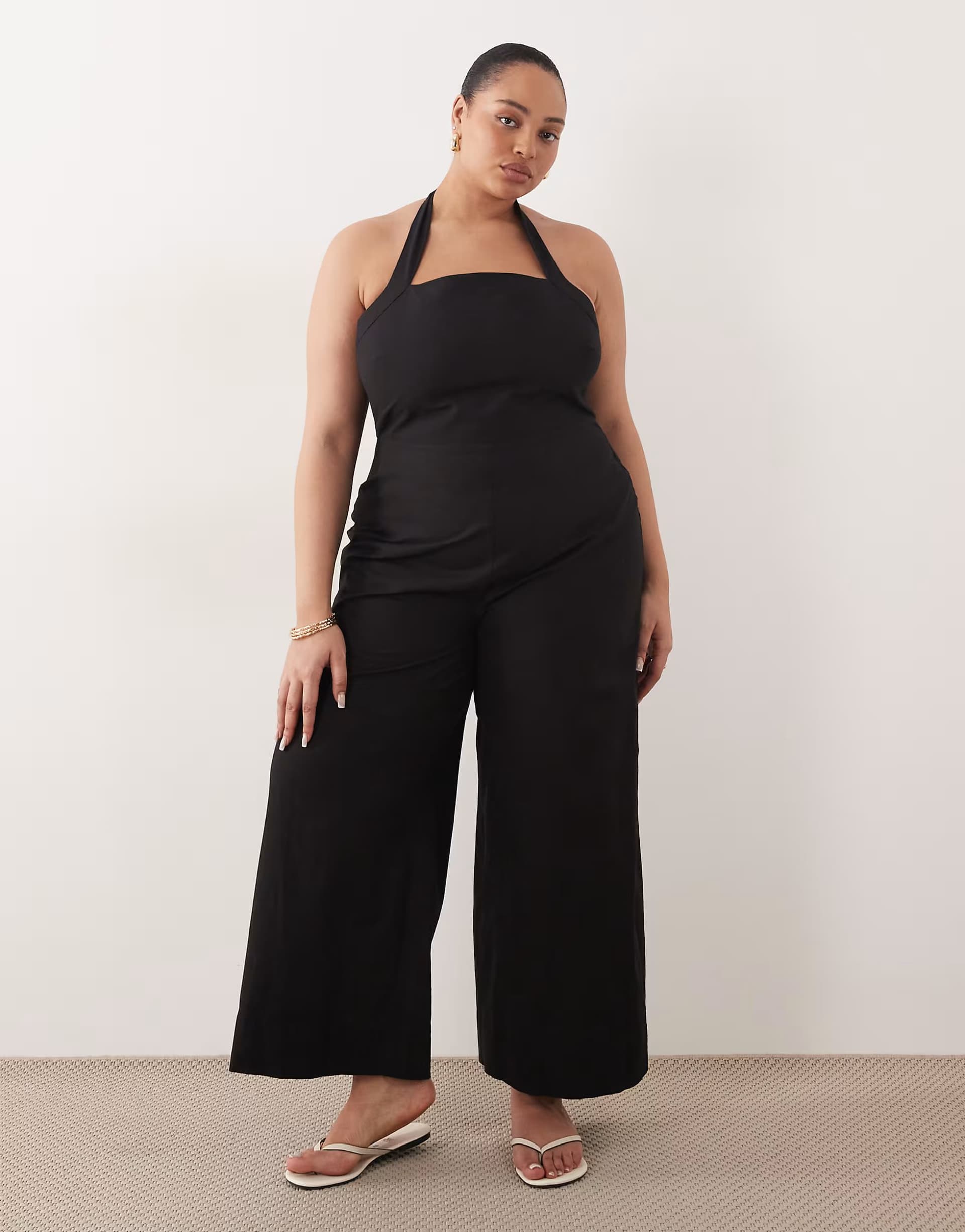ASOS ASOS DESIGN Curve halter neck jumpsuit in black