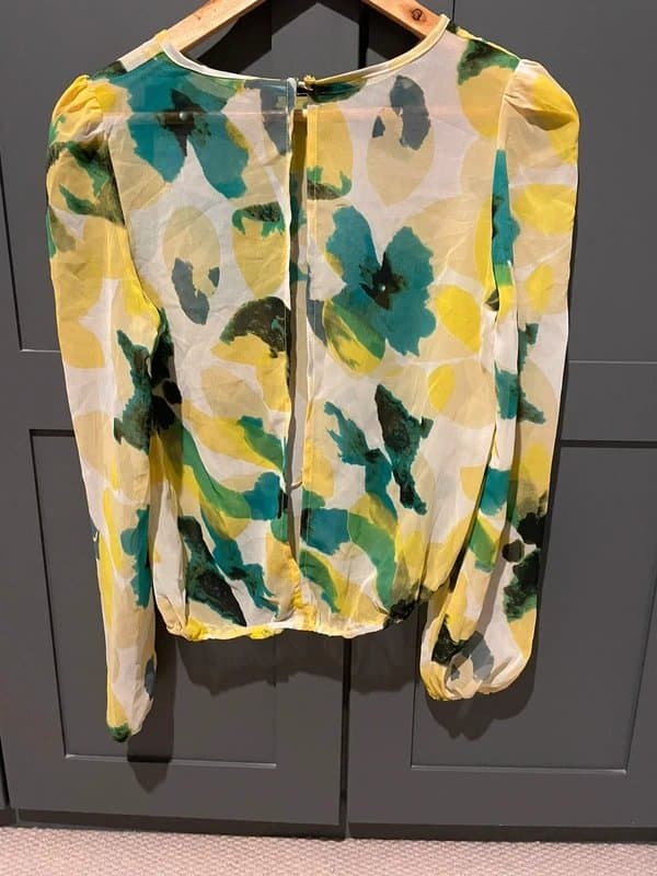 Never Fully Dressed Never fully dressed  bright chiffon open backed blouse. One size