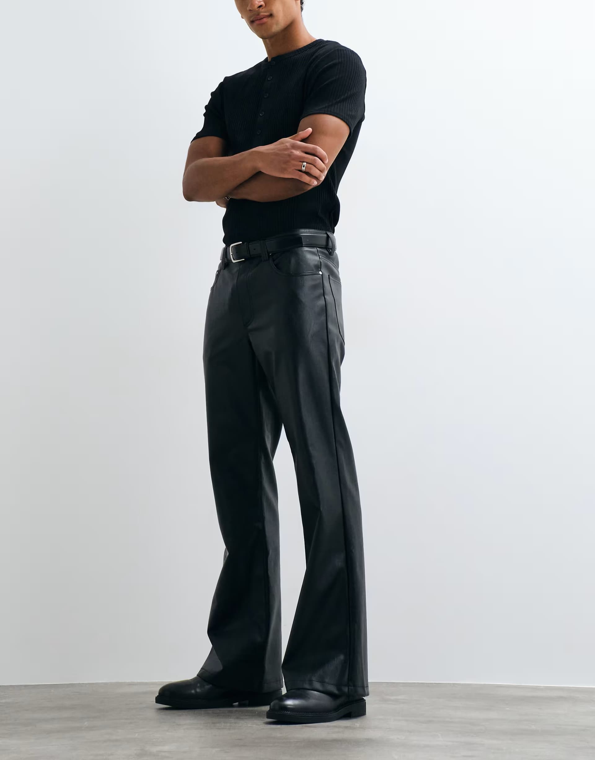 ASOS ASOS DESIGN wide flare trousers in black faux leather