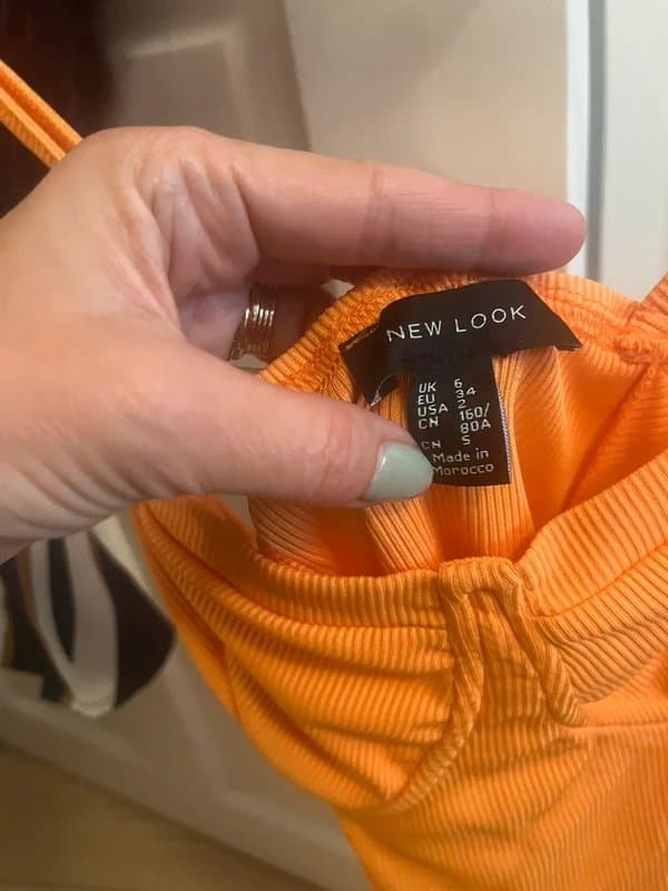 New Look New Look Size 6 orange bodysuit in excellent condition