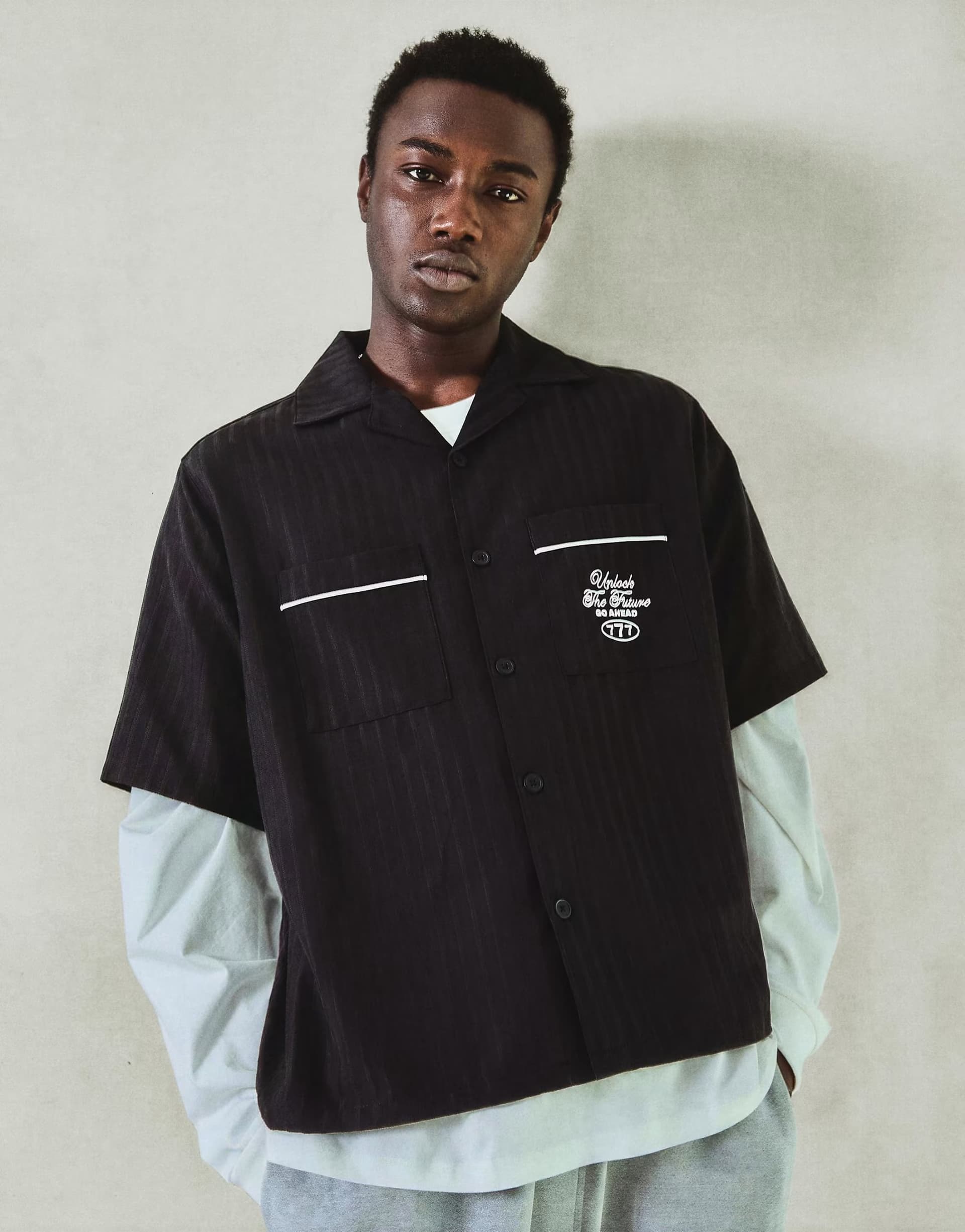 ASOS Bershka Embroidered boxy short sleeve shirt in black