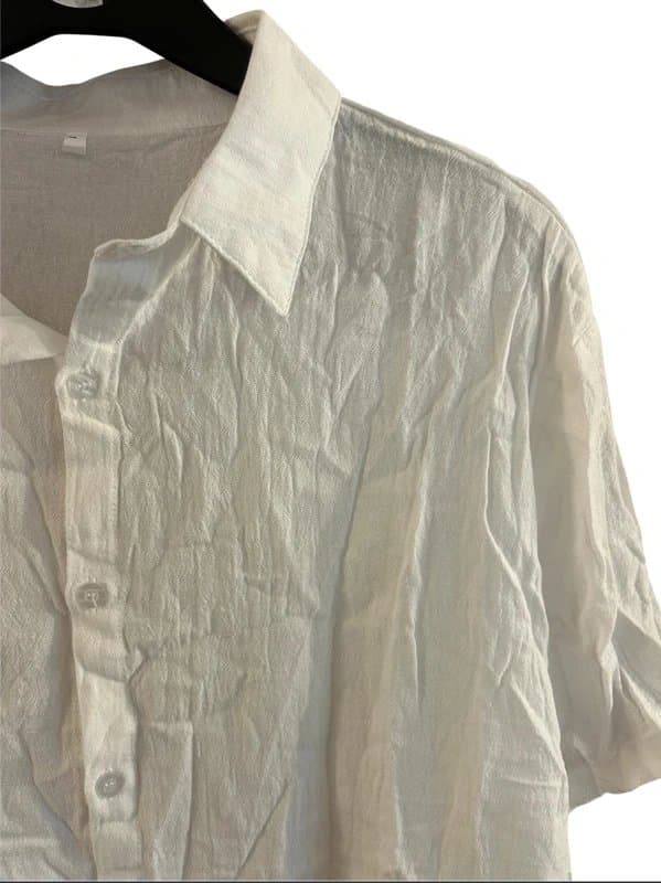 Ideal A woman's white short-sleeved beach cover-up shirt. Size 10-12