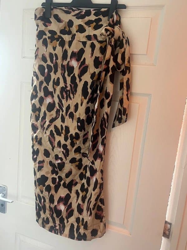 Never Fully Dressed Never Fully Dressed Leopard print satin wrap skirt