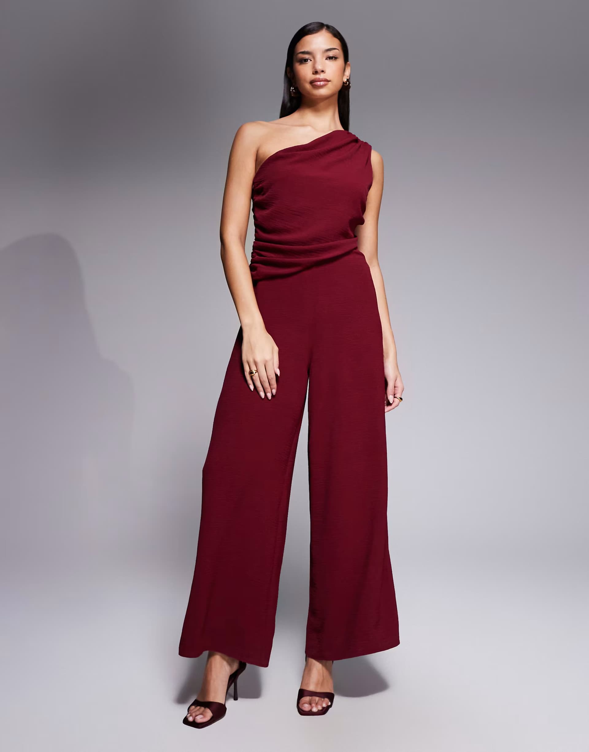 ASOS ASOS DESIGN draped one shoulder jumpsuit in burgundy