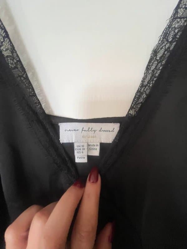 Never Fully Dressed Never fully dressed black silk and lace dress petite size 10