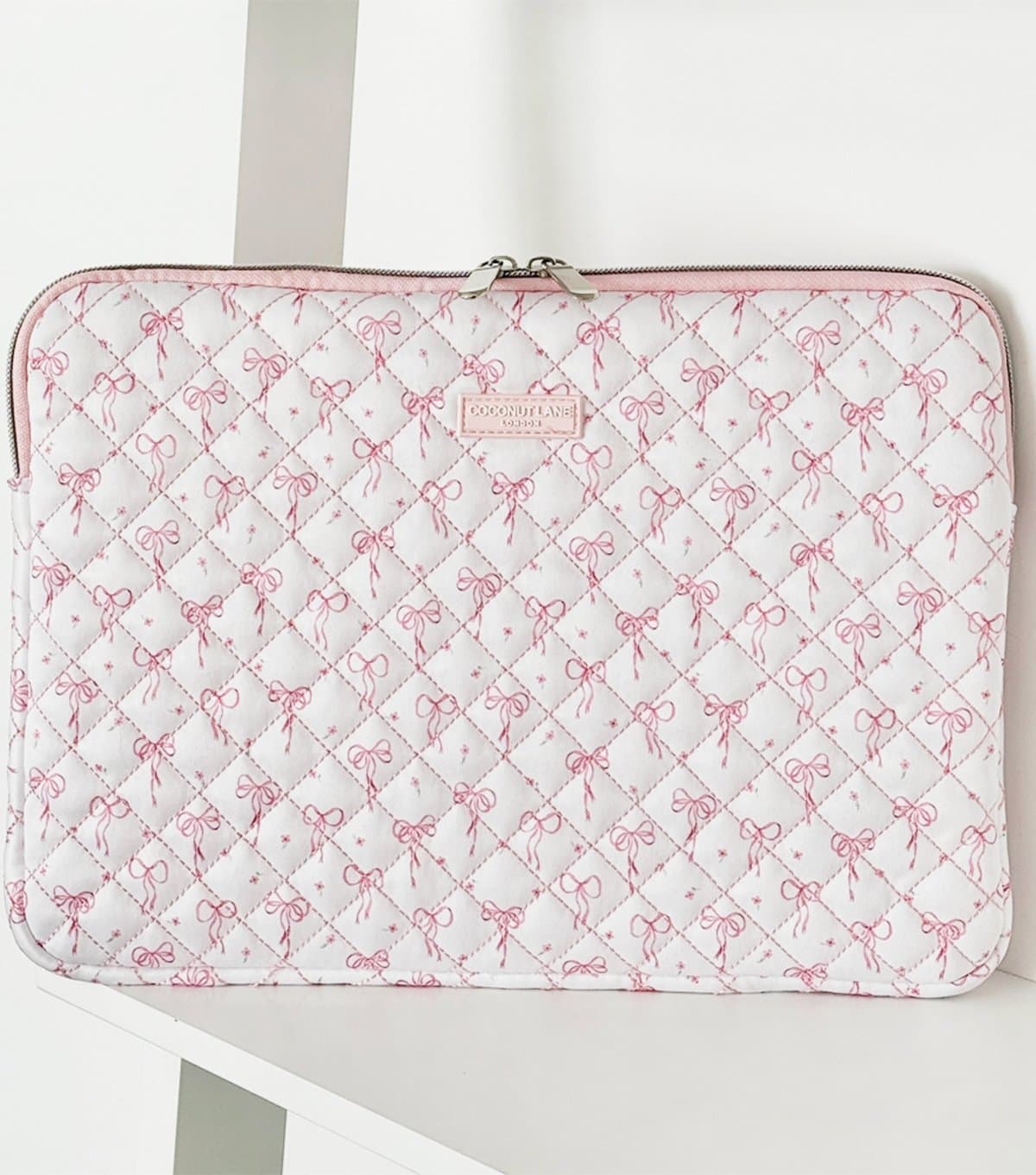 Coconut Lane White Quilted Bows Laptop Sleeve Coconut Lane New Look