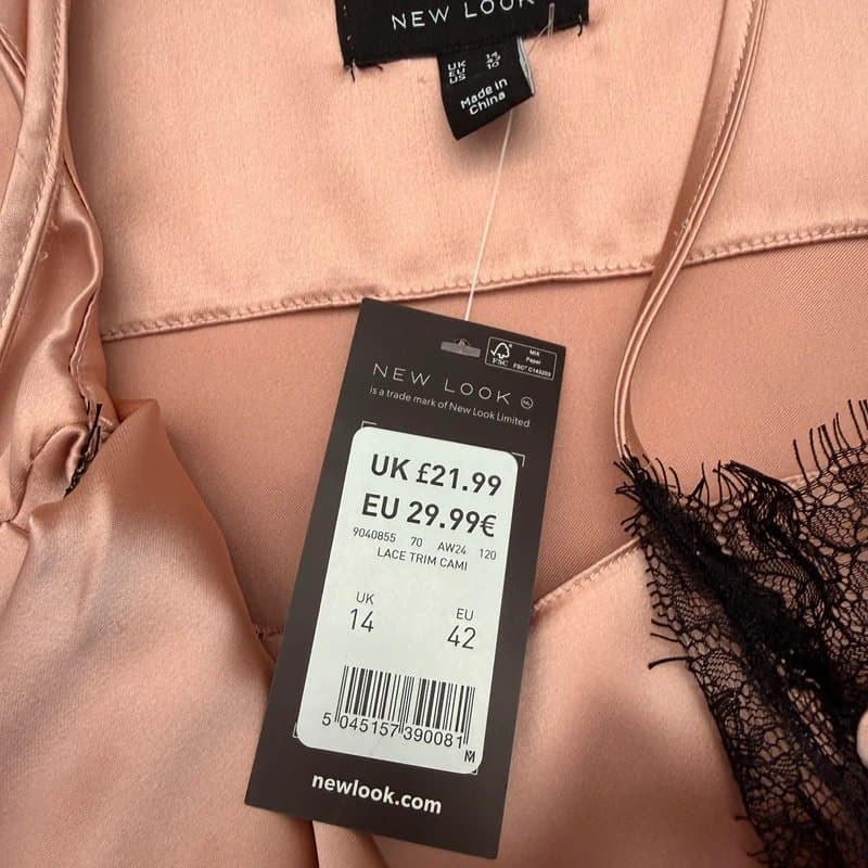 New Look Beautiful New look pink silky cami with lace neckline. Brand new.