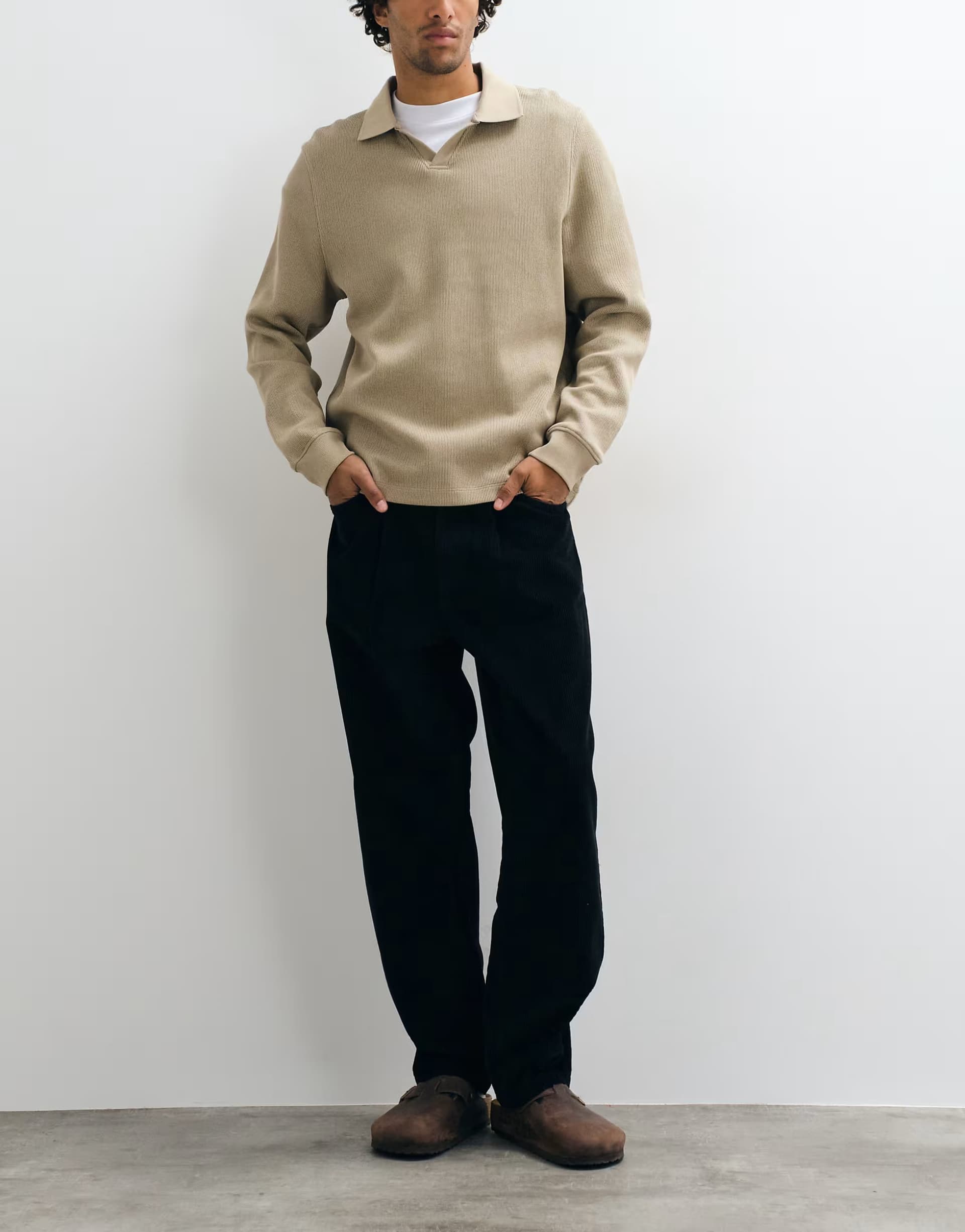 ASOS ASOS DESIGN relaxed tapered corduroy trousers in black