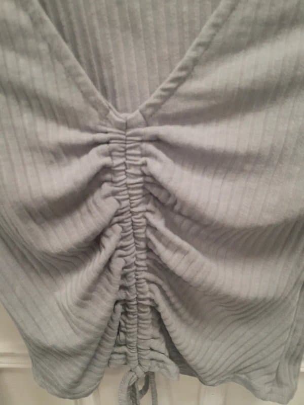 New Look New Look. Size 10, Light Grey, long sleeve V Neck ribbed top with Gather string. MAR26a