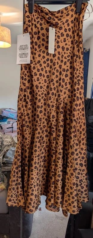 Never Fully Dressed Never fully dressed leopard print silk skirt.