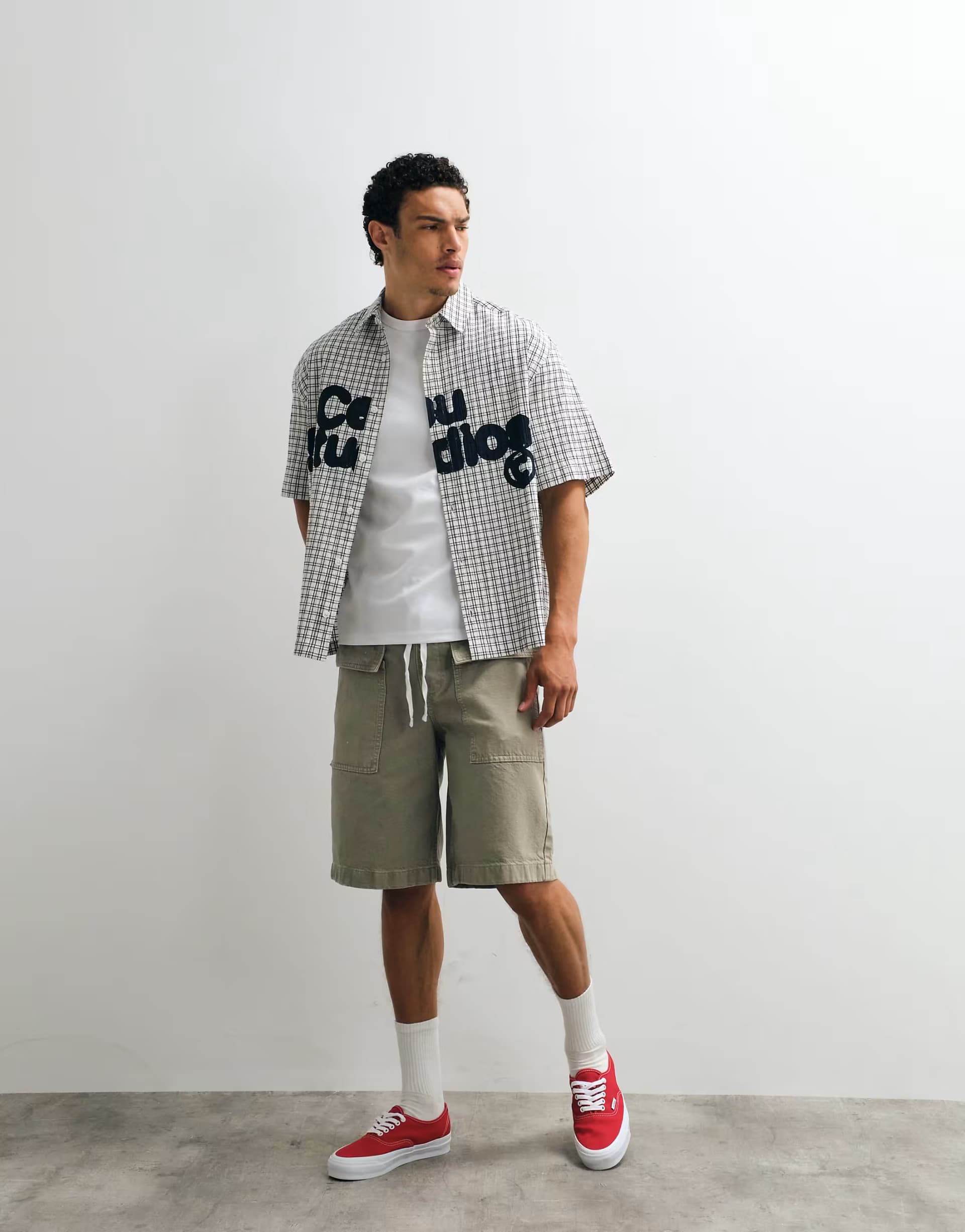 ASOS ASOS DESIGN boxy oversized check shirt with chest print in black and white