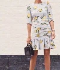 Never Fully Dressed Never Fully Dressed Lemon Mini Peplum Dress M