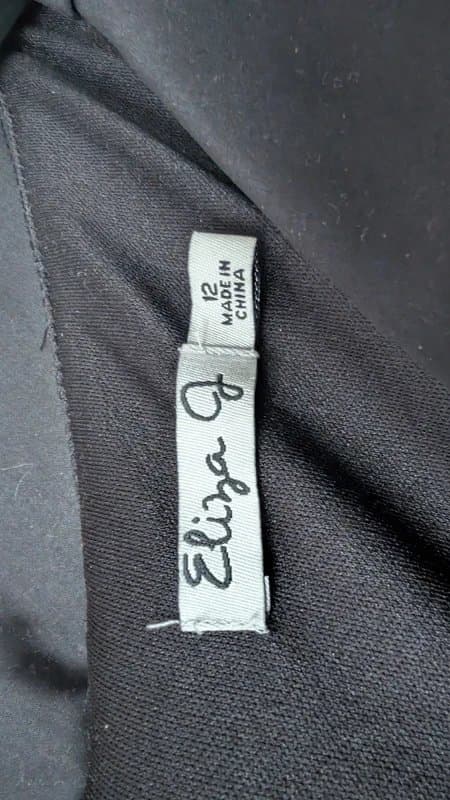 Eliza J Eliza J - New with tags. Fit and flare fifties style black cocktail midi dress