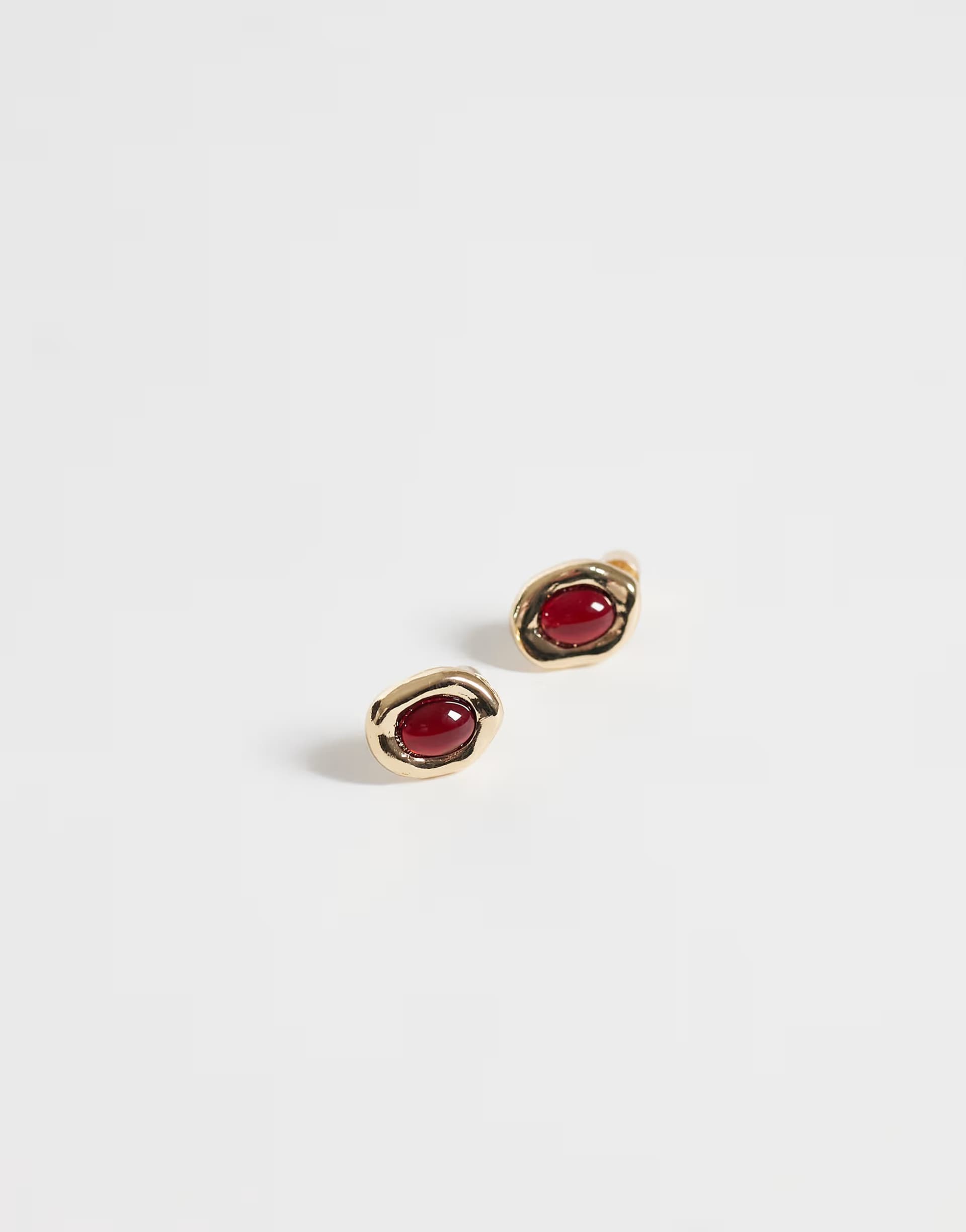 ASOS ASOS DESIGN small molten stud earrings with burgundy stone set in gold tone