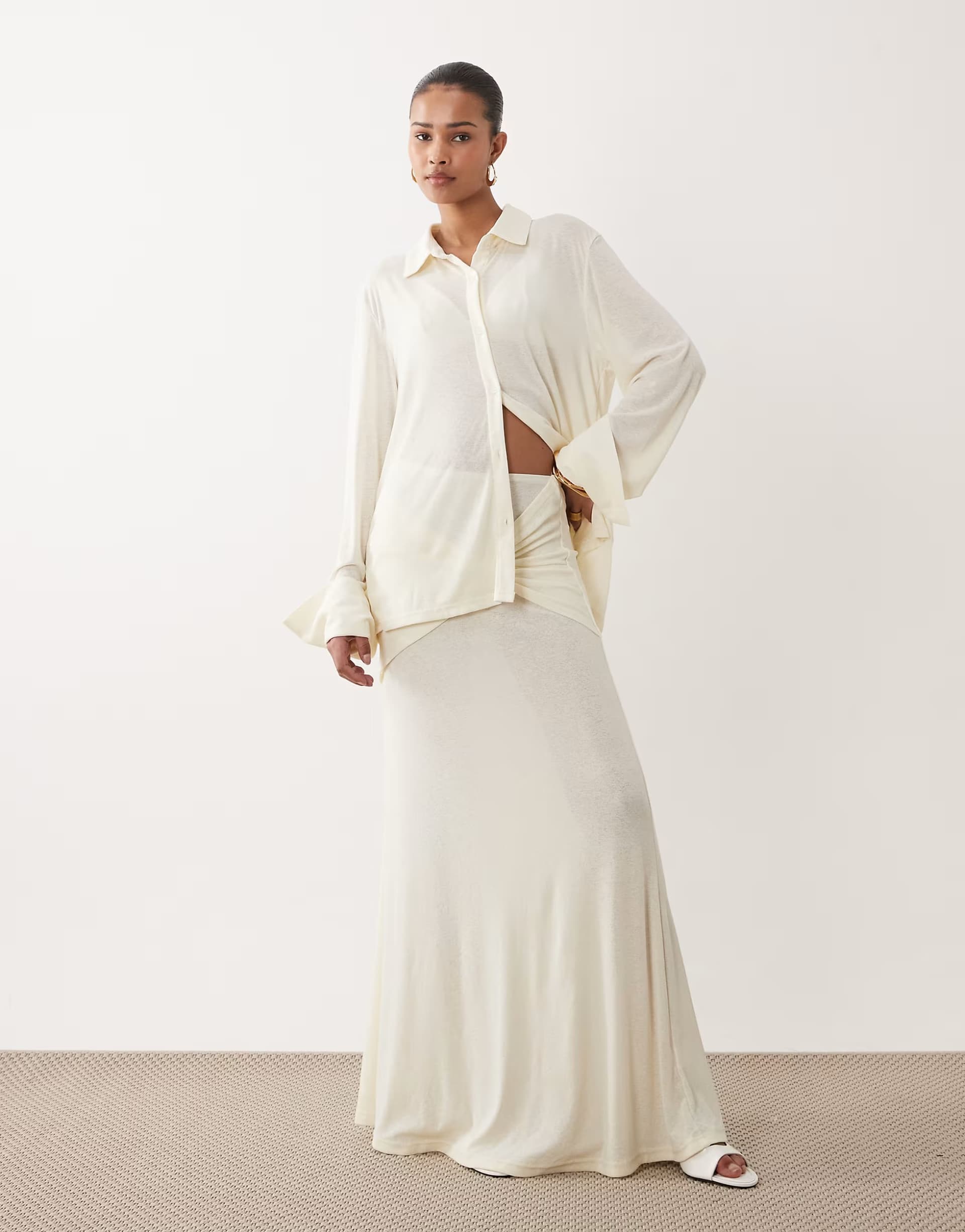 ASOS SNDYS soft fine knit semi sheer ruched twist front detail maxi skirt co-ord in off white