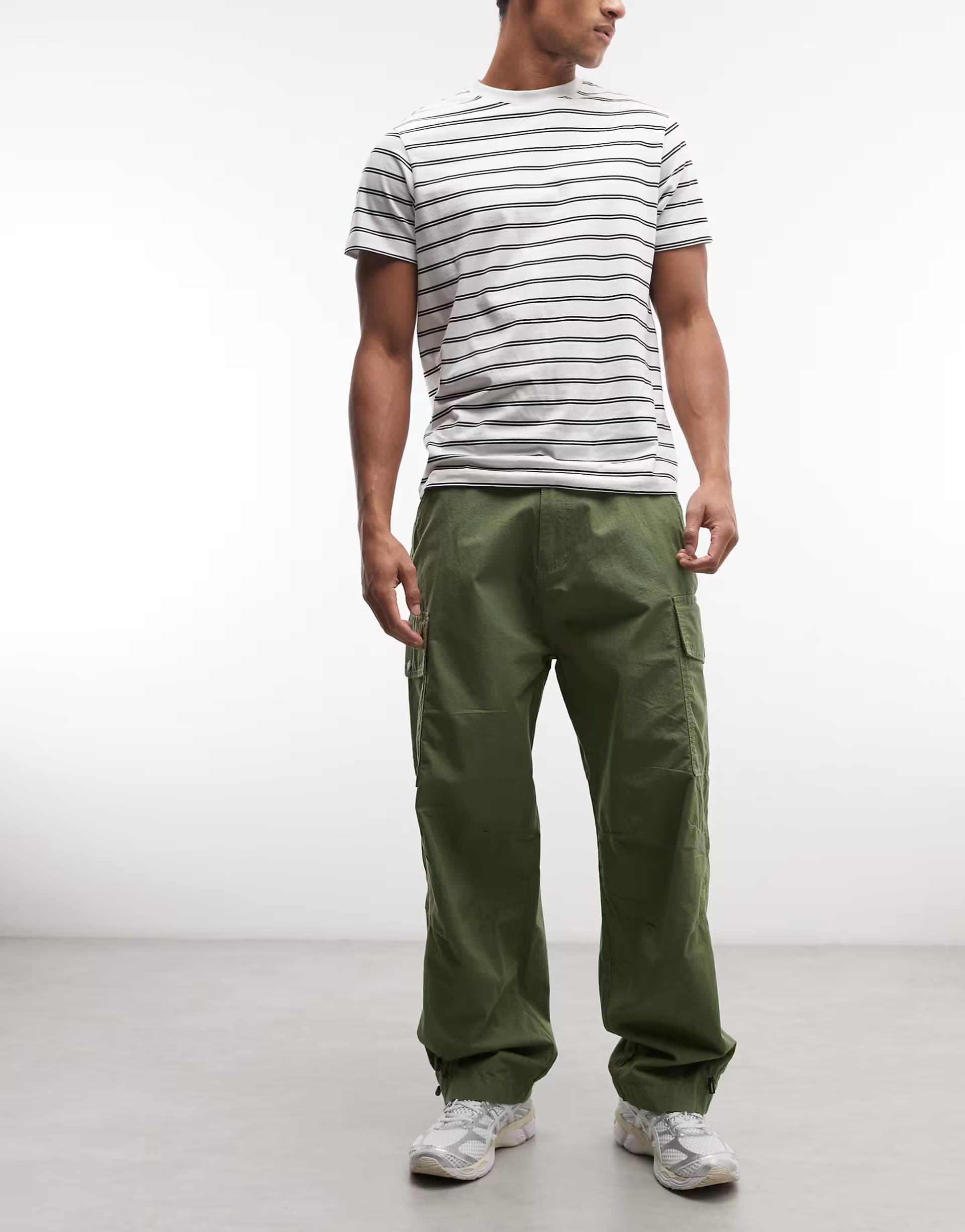 ASOS Alpha Industries cargo trousers with adjustable leg toggles in khaki