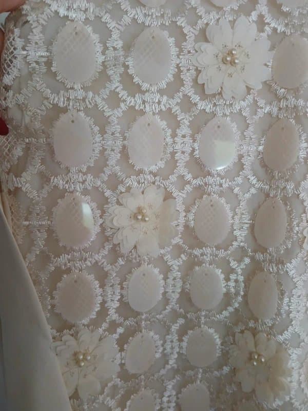 Never Fully Dressed Cream  embellished  dress with  satin ribbon  at the back