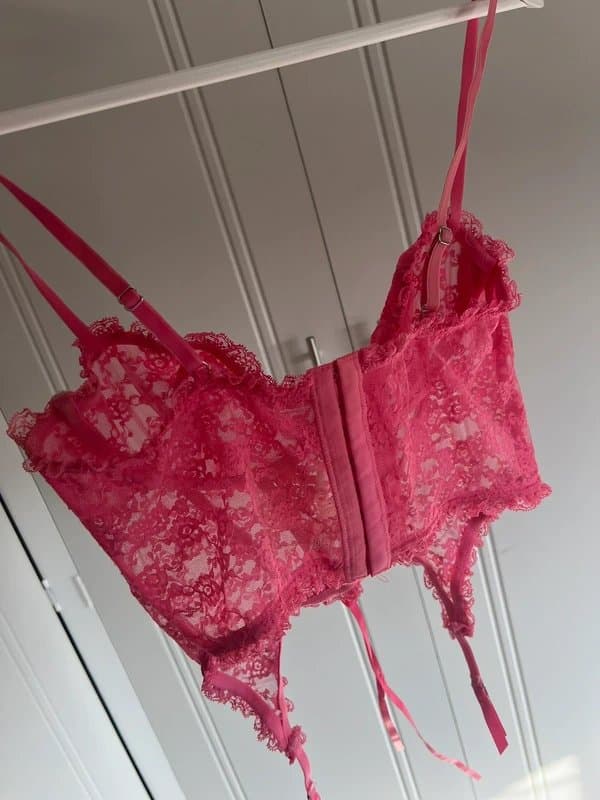 Urban Outfitters Urban outfitters out from under pink lace corset top