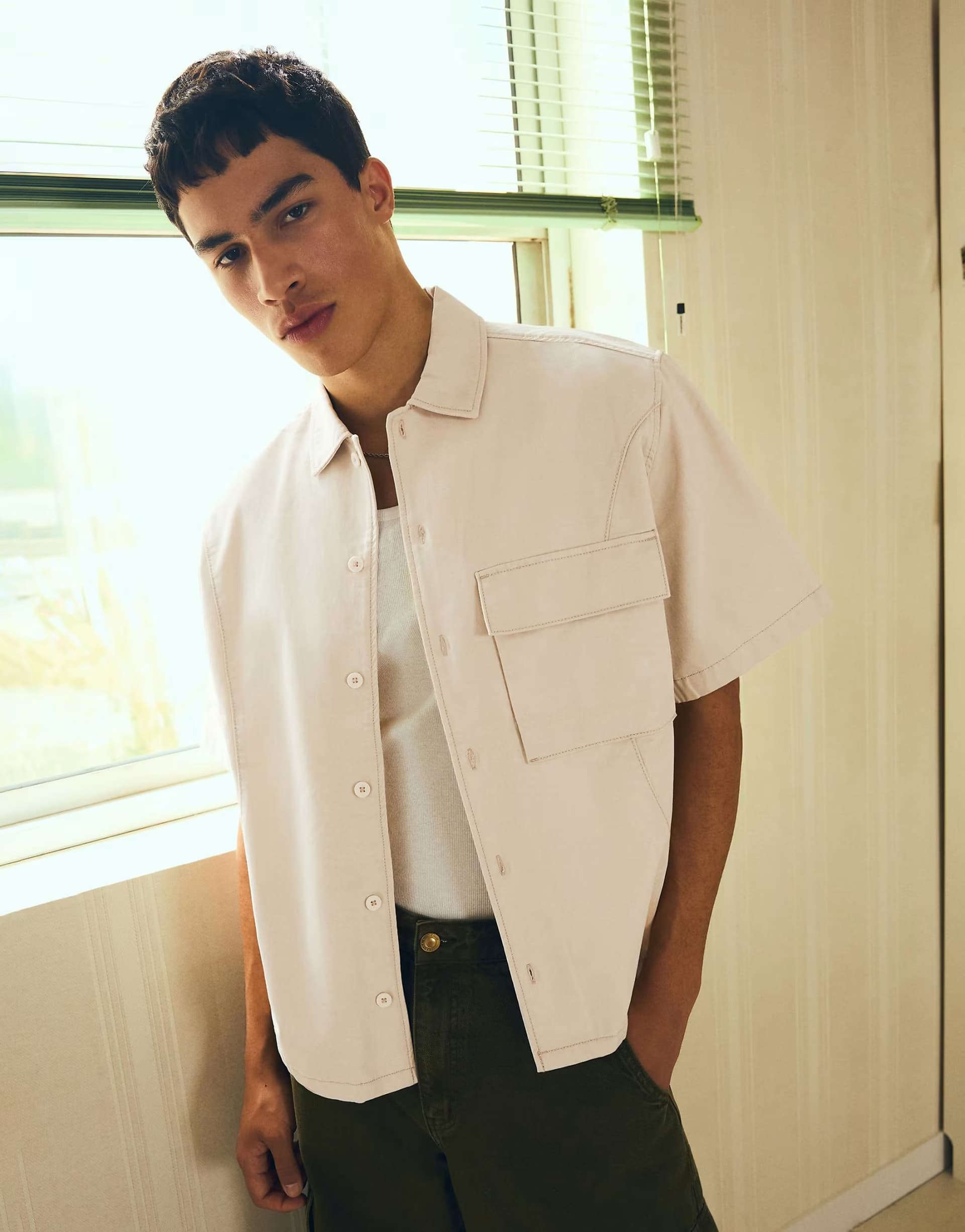 ASOS Bershka Boxy short sleeve shirt in beige