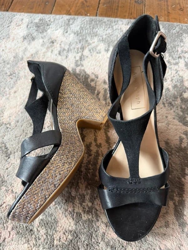 Marks & Spencer Marks and Spencer black leather with gold platform heels. Size 5