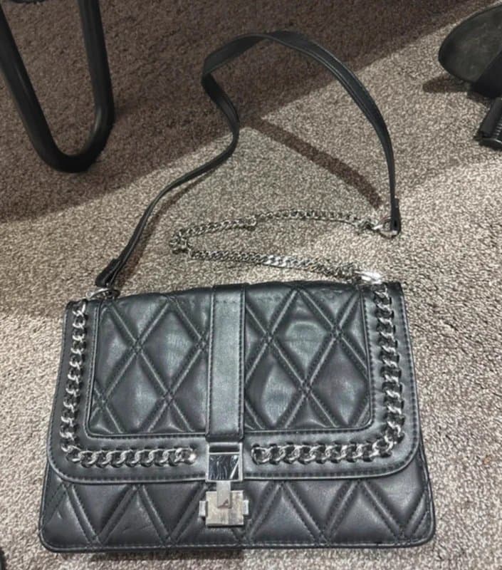 Topshop Black leather quilted hand bag with silver clasp and chain