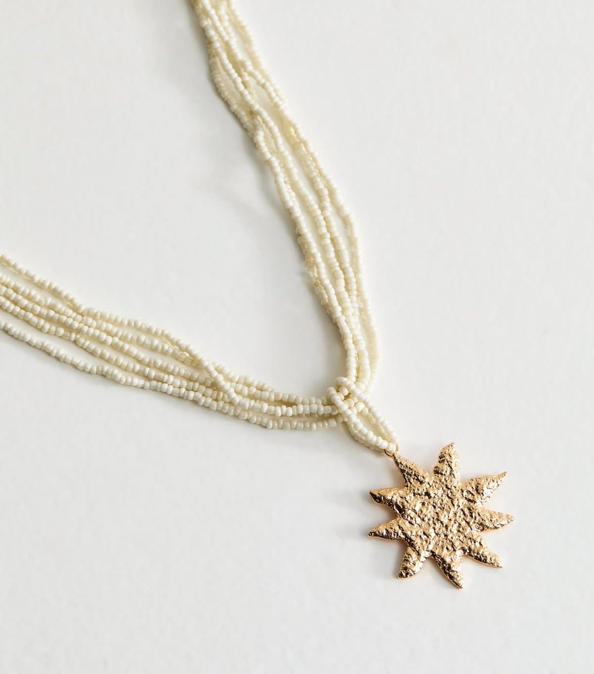 New Look New Look Cream Beaded Sun Pendant Necklace