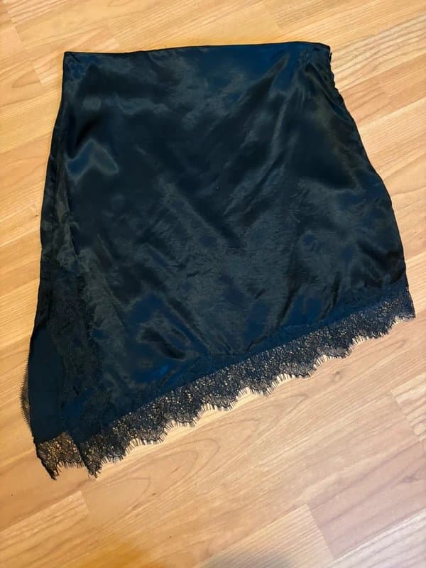 Bershka Black asymmetric satin skirt with lace hem