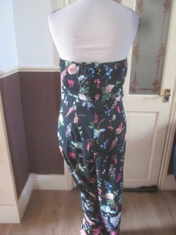 Lipsy Lipsy size 12 black floral twist front Halter summer Jumpsuit Brand new with tags