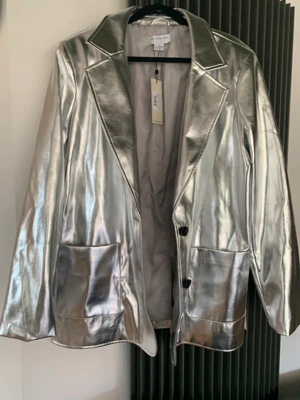 Never Fully Dressed Festival ready with this on trend silver blazer