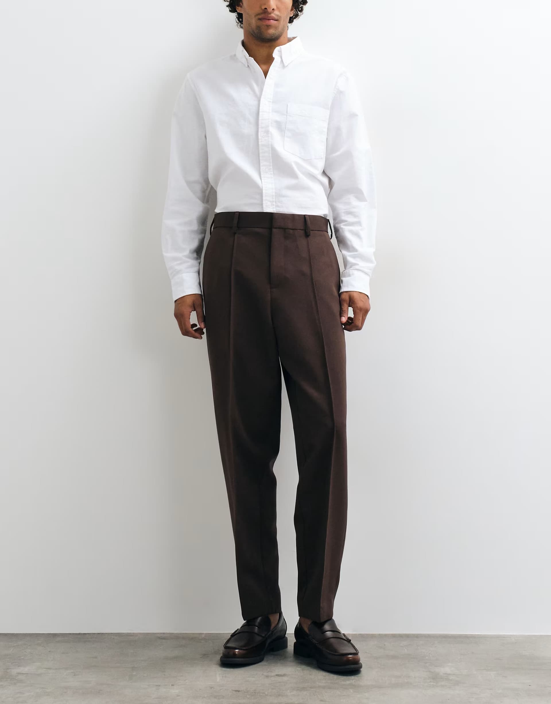 ASOS ASOS DESIGN tailored relaxed tapered trousers in brown with pintuck