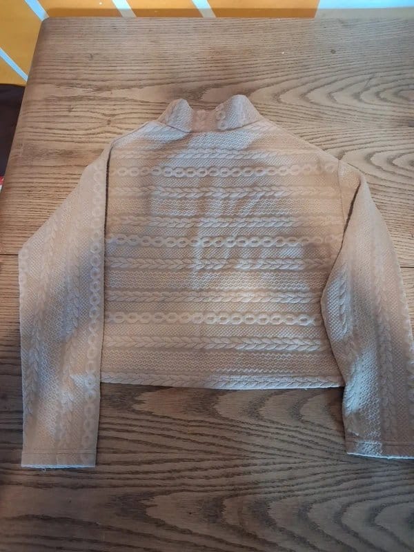 Beige knitted jumper