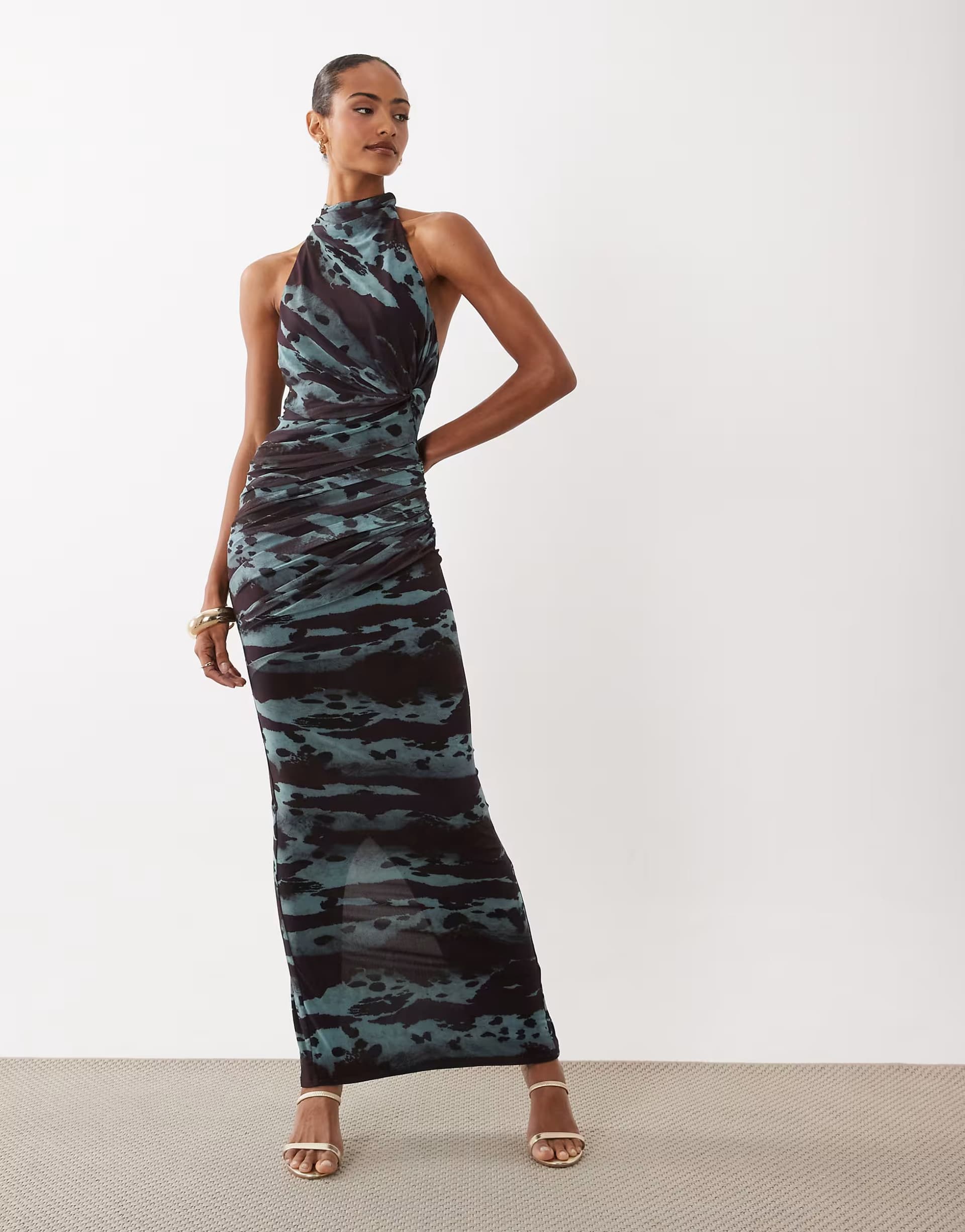 ASOS ASOS DESIGN mesh twist bust detail halter maxi dress with tie back neck in abstract print