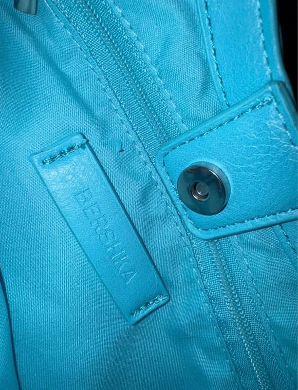 Bershka Bershka studded leather effect bucket bag aqua blue